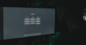 downloaded-image - Local SEO and Search Engine Marketing | FMS Online Marketing Dimly lit room with a computer monitor showing the ChatGPT interface on screen.